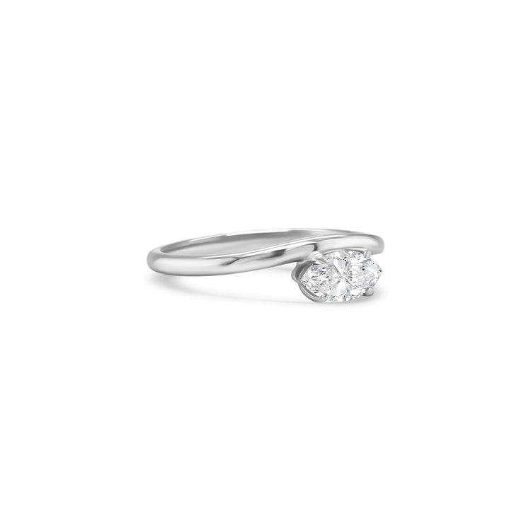 marquise cut diamond ring, solitaire diamond ring, white gold engagement ring, marquise diamond solitaire, white gold solitaire ring, minimalist diamond ring, elegant marquise ring, marquise diamond ring white gold, classic engagement ring, marquise cut white gold ring