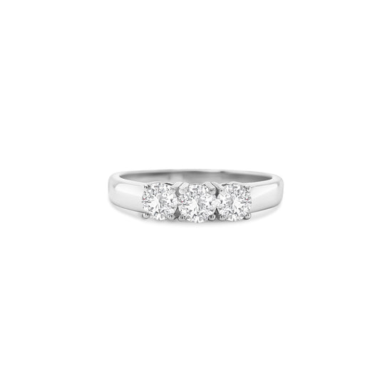 round brilliant diamond ring, trilogy diamond ring, white gold diamond ring, three stone diamond ring, white gold trilogy ring, round cut diamond ring, engagement trilogy ring, white gold engagement ring, classic diamond trilogy ring, bridal trilogy ring white gold