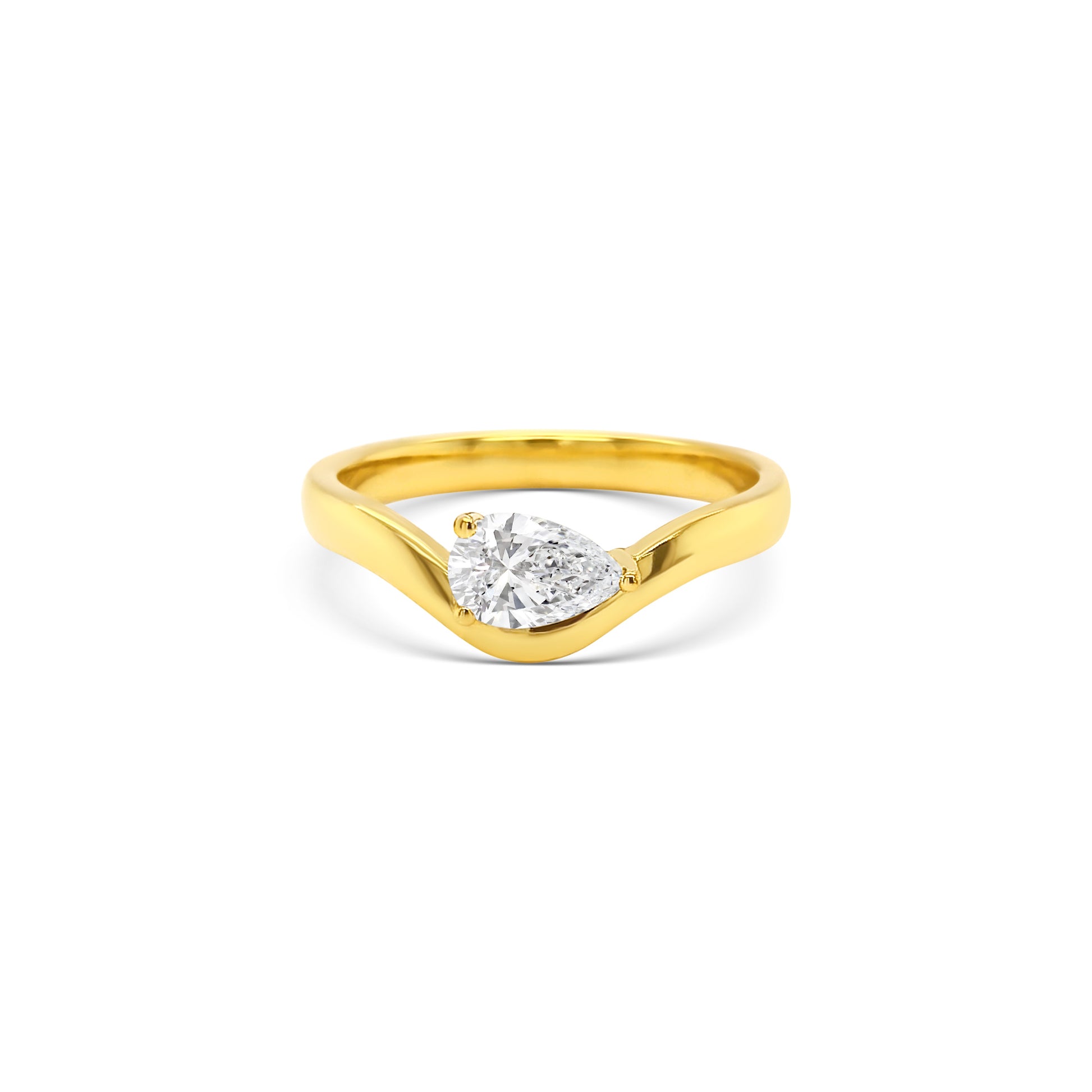 pear shaped diamond ring, yellow gold solitaire ring, bypass engagement ring, east-west diamond solitaire, modern pear diamond ring