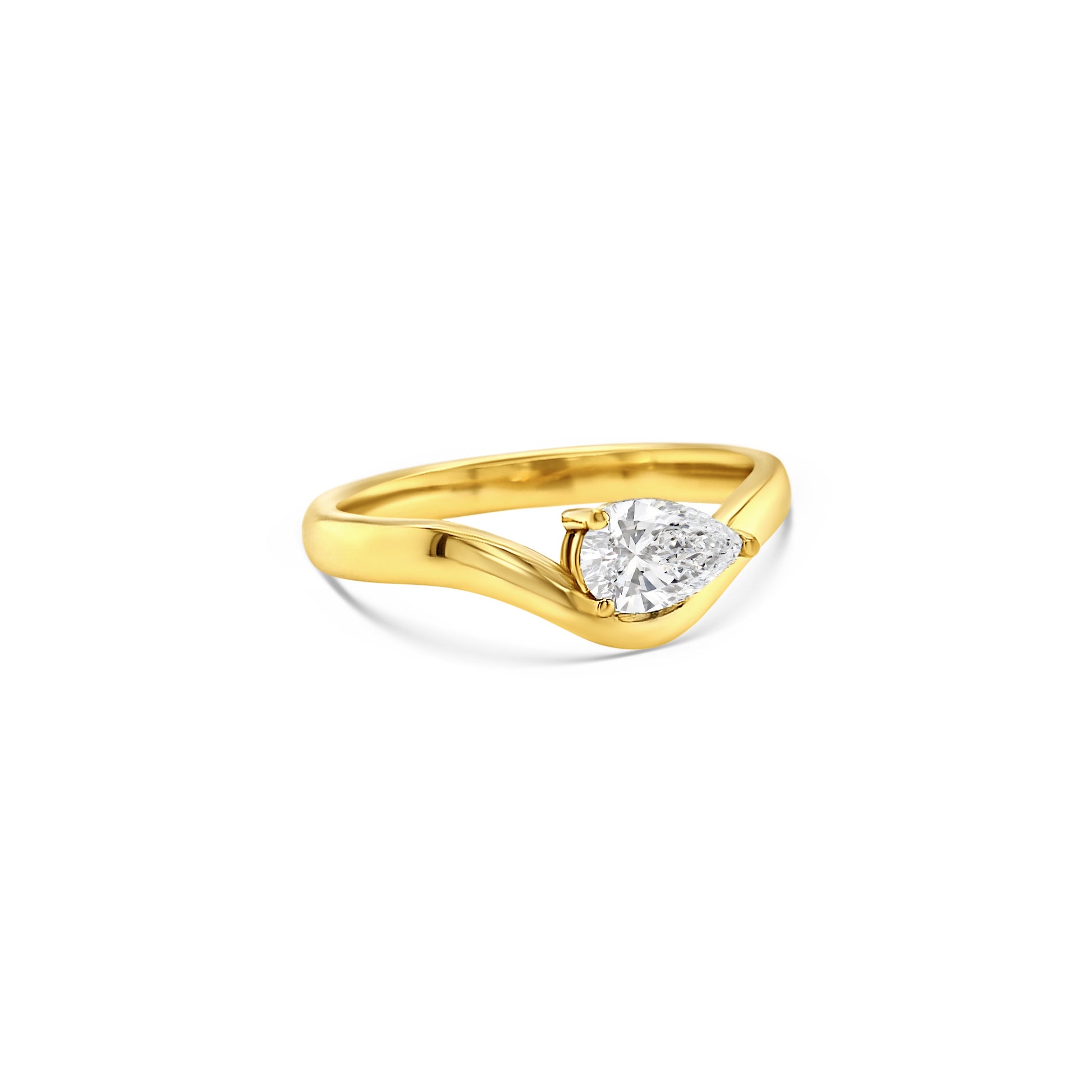 pear shaped diamond ring, yellow gold solitaire ring, bypass engagement ring, east-west diamond solitaire, modern pear diamond ring