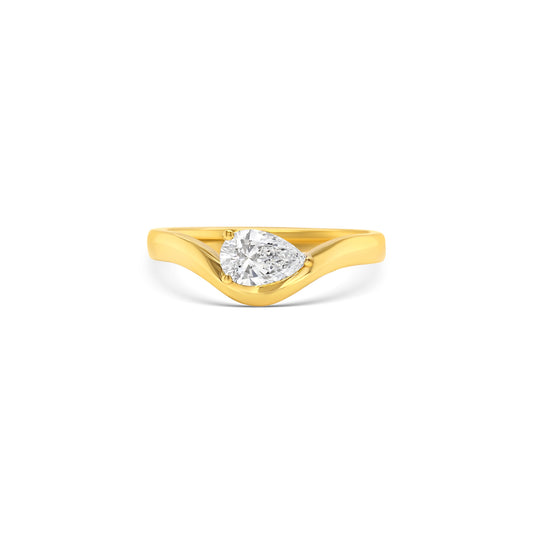 pear shaped diamond ring, yellow gold solitaire ring, bypass engagement ring, east-west diamond solitaire, modern pear diamond ring