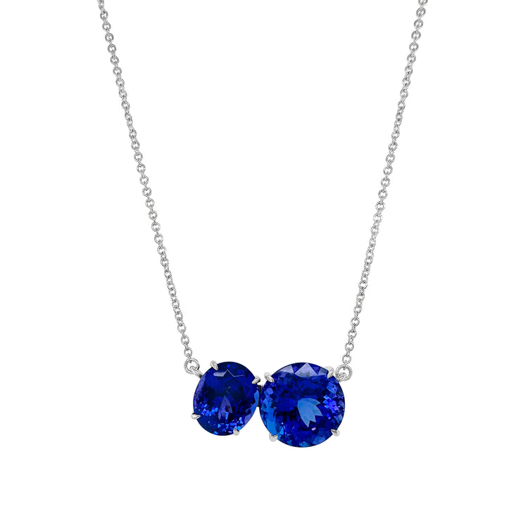 "Round & Oval Two Stone Tanzanite Necklace," "Exquisite Round and Oval Tanzanite Necklace," "Luxurious Two Stone Tanzanite Necklace," "Elegant Round and Oval Tanzanite Gemstone Necklace," "Fine Jewelry Tanzanite Necklace with Two Stones," "High-Quality Round & Oval Tanzanite Necklace," "Statement Two Stone Tanzanite Necklace," "Sparkling Tanzanite Necklace with Round and Oval Stones," "Beautiful Two Stone Tanzanite Necklace," "Fashionable Round & Oval Tanzanite Necklace."