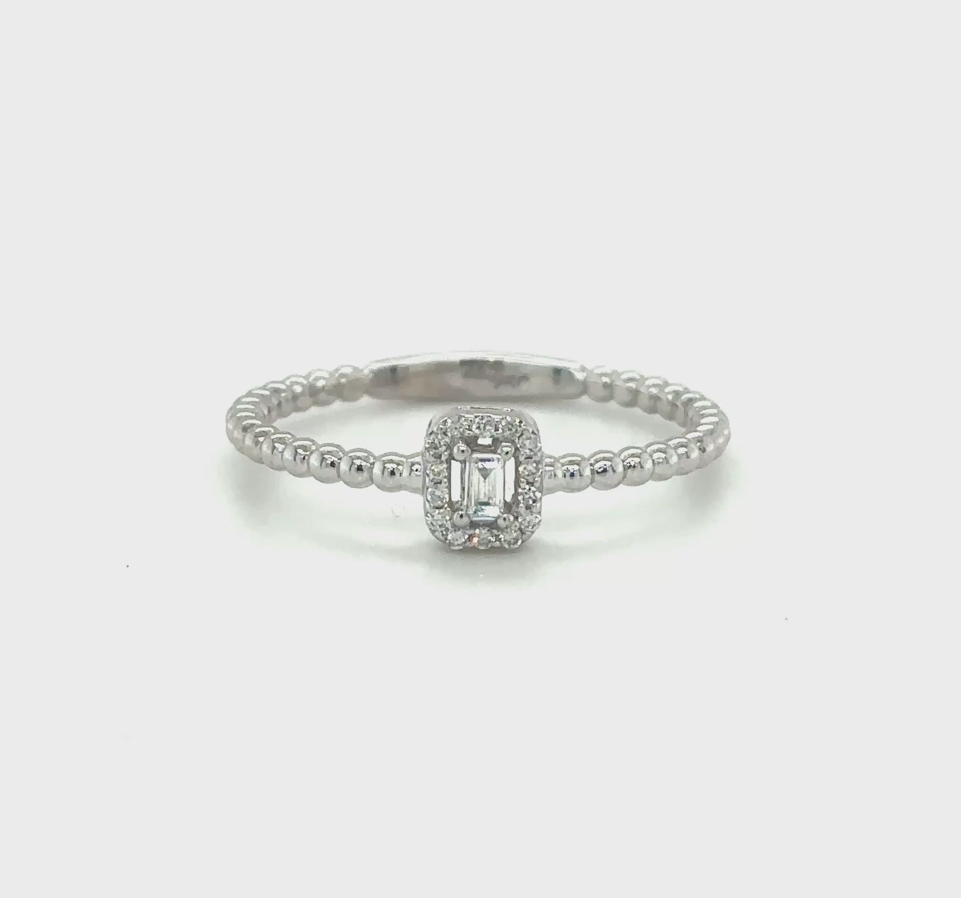 baguette and round brilliant halo ring, petite halo diamond ring, illusion set diamond ring, beaded band diamond ring, dainty diamond ring, modern engagement ring, minimal diamond jewellery