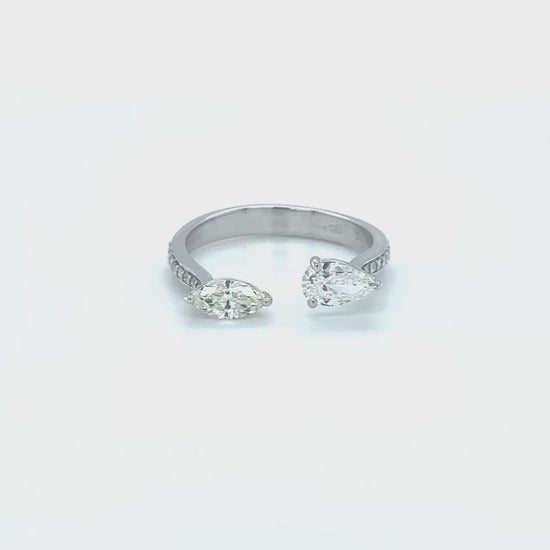 "Two stone diamond ring, Pear cut diamond ring, Marquise cut diamond ring, Diamond engagement ring, Diamond anniversary ring, Two stone engagement ring, Pear and Marquise cut diamond ring, Two stone wedding ring, Pear and Marquise cut diamond anniversary ring, Dual stone diamond ring."