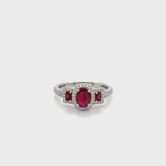 "Ruby & Diamond Trilogy Halo Ring, exquisite ruby ring, stunning diamond ring, elegant halo ring, luxurious gemstone ring, statement jewelry piece, breathtaking ruby and diamond ring, dazzling gemstone halo ring, fine jewelry masterpiece, exquisite ruby and diamond jewelry, high-quality gemstone ring"