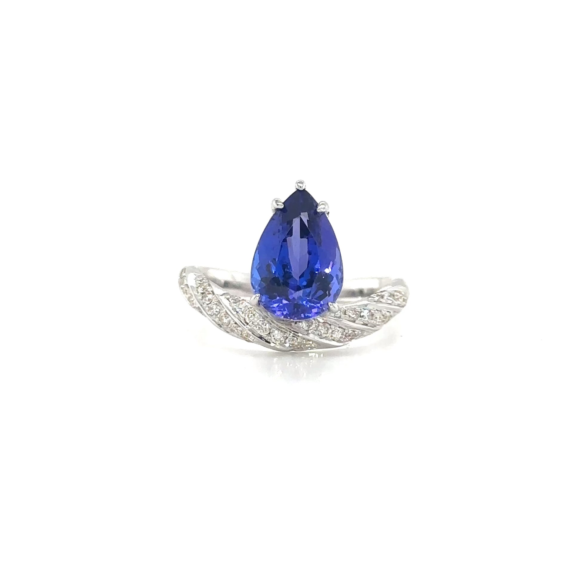 Pear Shape Tanzanite & Diamond Ring, Tanzanite Ring, Diamond Ring, Pear Shape Gemstone, Tanzanite Jewelry, Diamond Jewelry, Pear Shape Ring, Tanzanite and Diamond Design, Elegant Tanzanite Ring, Fine Jewelry Ring.