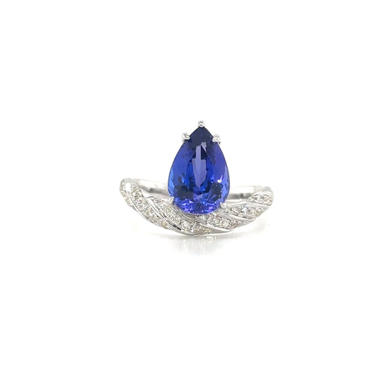 Pear Shape Tanzanite & Diamond Ring, Tanzanite Ring, Diamond Ring, Pear Shape Gemstone, Tanzanite Jewelry, Diamond Jewelry, Pear Shape Ring, Tanzanite and Diamond Design, Elegant Tanzanite Ring, Fine Jewelry Ring.