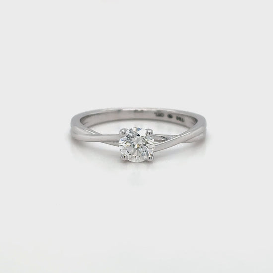 Solitaire round brilliant diamond ring, Classic solitaire engagement ring with round brilliant cut, Elegant round brilliant cut diamond solitaire in white gold, Timeless round diamond solitaire ring setting, Minimalist solitaire ring featuring round brilliant diamond, Round brilliant solitaire engagement ring in prong setting, Dainty round diamond solitaire ring for engagement or special occasions