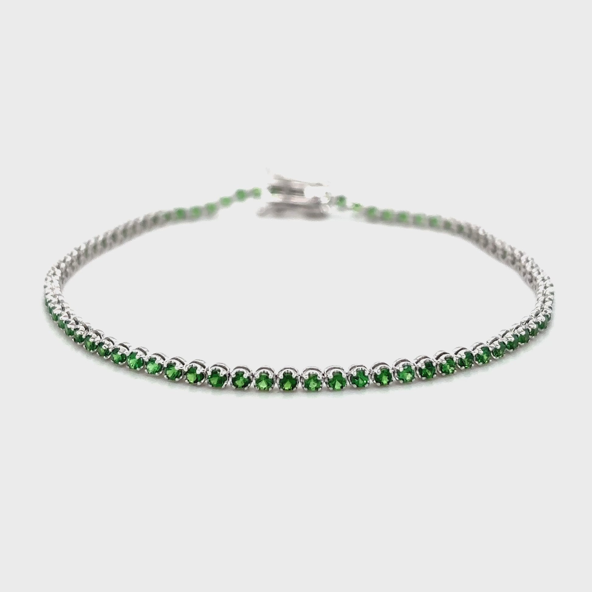 Elegant round Tsavorite green gemstone bracelet in gold setting, Luxury Tsavorite bracelet featuring round-cut green garnet stones, Handcrafted round Tsavorite bracelet with adjustable chain, Fine jewelry round Tsavorite bracelet for women, Sparkling green Tsavorite bracelet for everyday and special occasions