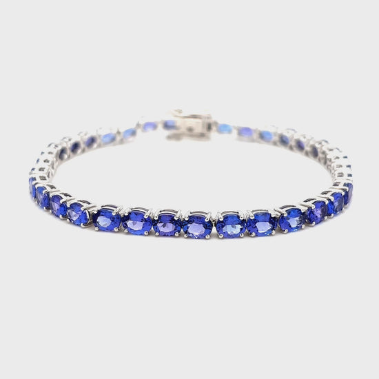 "Oval Cut Tanzanite Tennis Bracelet," "Tanzanite Tennis Bracelet," "Fine Jewelry," "Luxury Bracelet," "Fashion Bracelet," "Gemstone Jewelry," "Sparkling Tanzanite Bracelet," "Statement Bracelet," "Elegant Jewelry," "Special Occasion Bracelet," "Tanzanite Jewelry," "Timeless Jewelry," "Handcrafted Bracelet," "Unique Gemstone Bracelet," "Classic Tennis Bracelet."