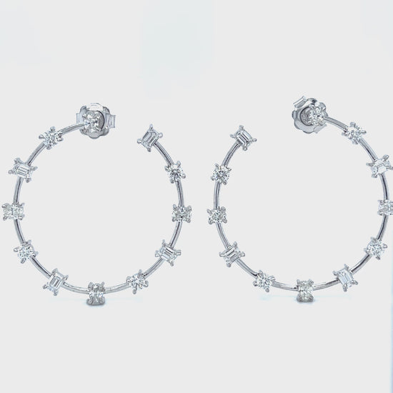 "Round Brilliant Oval & Emerald Cut Diamond Hoop Earrings," "Luxury Diamond Hoop Earrings with Round Oval and Emerald Cuts," "Elegant Multi Shape Diamond Hoop Earrings," "Round Brilliant Diamond Hoop Earrings," "Oval Cut Diamond Hoop Earrings," "Emerald Cut Diamond Hoop Earrings," "Exquisite Multi Cut Diamond Hoop Earrings," "Fine Jewelry Diamond Hoop Earrings Multi Shapes," "Unique Round Oval Emerald Cut Diamond Hoop Earrings," "Sparkling Diamond Hoop Earrings with Round Brilliant Oval and Emerald Cuts."