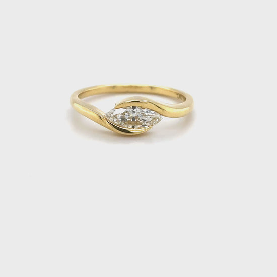 marquise diamond ring, yellow gold diamond ring, marquise cut solitaire, bypass diamond ring, elegant engagement ring, fine gold jewelry, women’s diamond ring, marquise solitaire gold ring, luxury diamond jewelry, marquise engagement ring