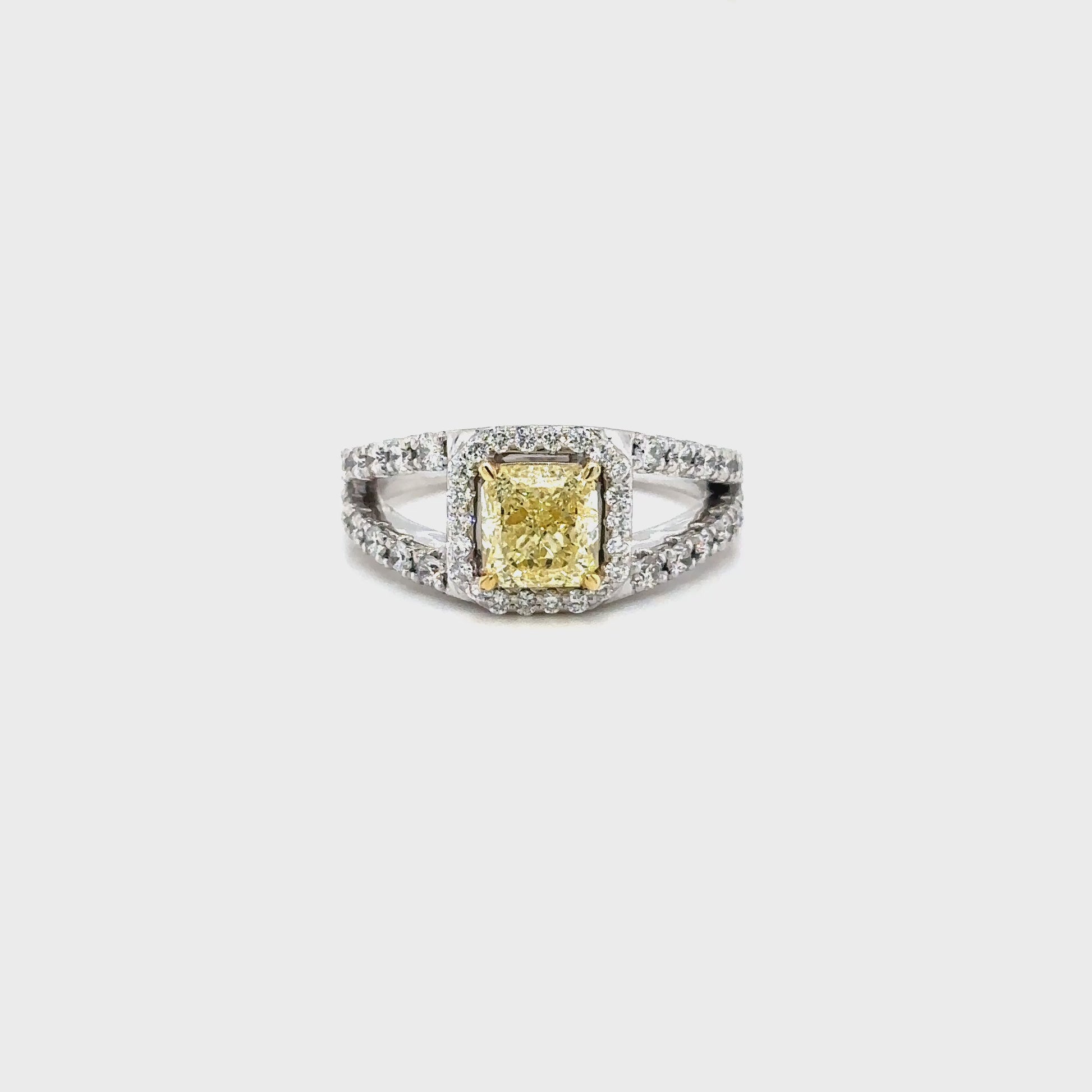 fancy yellow diamond ring, radiant cut yellow diamond, yellow diamond split shank ring, yellow halo engagement ring, luxury coloured diamond ring