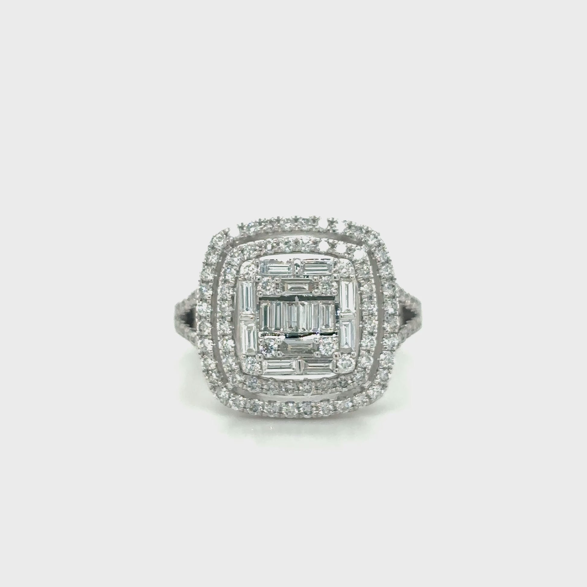 baguette and round brilliant diamond ring, illusion diamond ring, split shank engagement ring, contemporary diamond ring design, double illusion diamond setting, luxury diamond cocktail ring, elegant white gold diamond ring