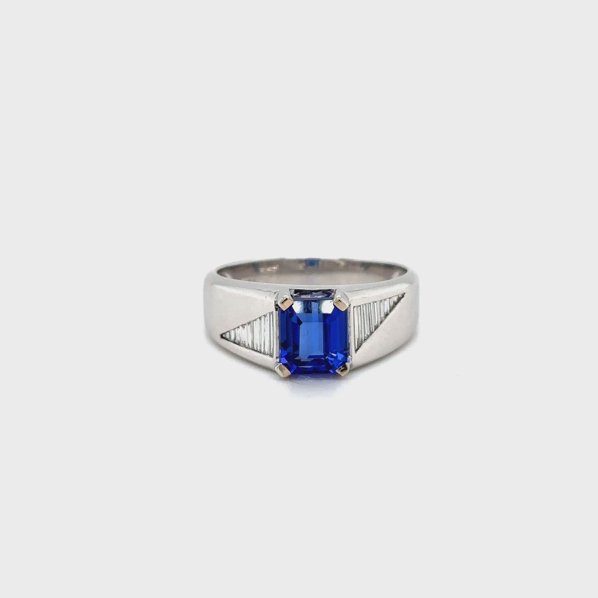 "Emerald Cut Tanzanite & Diamond Ring," "Luxury Emerald Cut Tanzanite and Diamond Ring," "Elegant Emerald Cut Tanzanite Diamond Engagement Ring," "Emerald Cut Tanzanite with Diamond Accents Ring," "Exquisite Emerald Cut Tanzanite & Diamond Cocktail Ring," "Fine Jewelry Emerald Cut Tanzanite and Diamond Ring," "Unique Emerald Cut Tanzanite and Diamond Ring Design," "Beautiful Emerald Cut Tanzanite & Diamond Ring," "Timeless Emerald Cut Tanzanite and Diamond Ring," "Sparkling Emerald Cut Tanzanite with Diamon