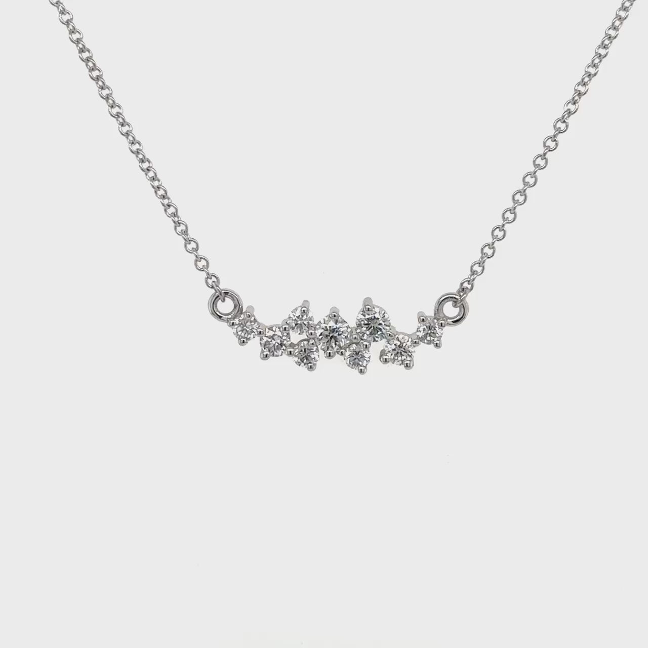A stunning, elegant, round brilliant diamond pendant, sparkling, luxurious, fine jewelry, timeless, exquisite, accessory, perfect for any occasion, adding sophistication, enhancing beauty, statement piece, classic, radiant, shimmering, eye-catching, symbol of elegance.