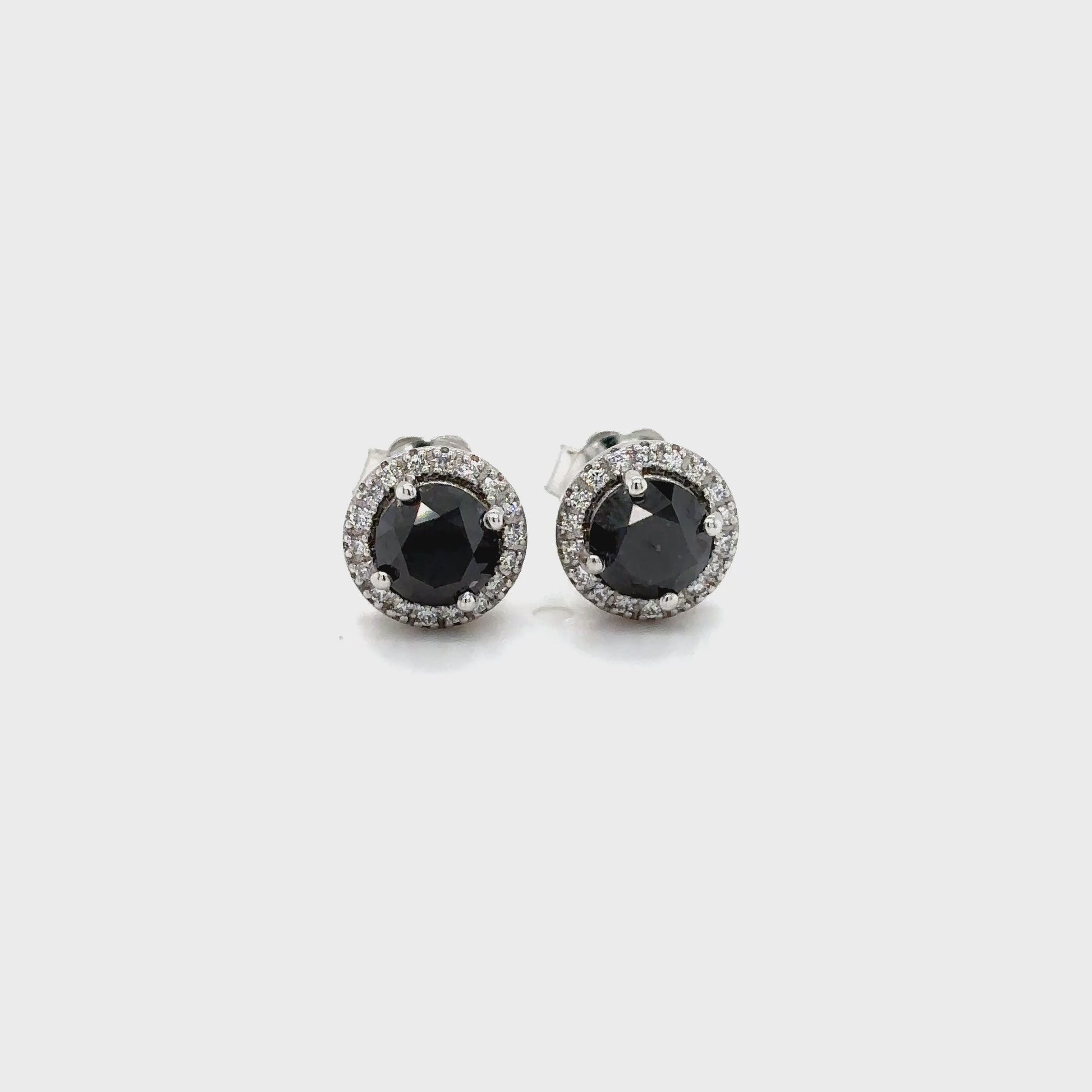 Round Cut Black Diamond & White Diamond Halo Stud Earrings, Black and White Diamond Halo Stud Earrings, Round Black Diamond Studs with Halo, Luxury Black Diamond Earrings, Fine Jewelry Black and White Diamond Earrings, Elegant Black Diamond Halo Studs, Round Cut Black Diamond Earrings, Black Diamond and White Diamond Studs