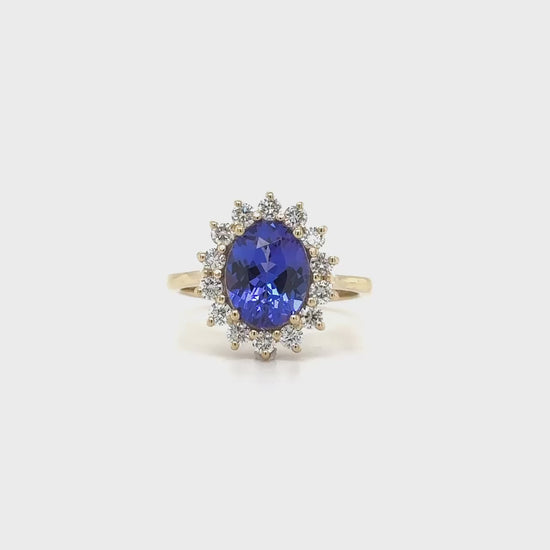 Oval Solitaire Tanzanite Floral Diamond Halo Ring, Oval Tanzanite Solitaire Ring, Floral Diamond Halo Tanzanite Ring, Luxury Tanzanite Diamond Ring, Oval Cut Tanzanite Engagement Ring, Fine Jewelry Tanzanite Ring, Elegant Oval Tanzanite Diamond Ring, Tanzanite Floral Design Halo Ring