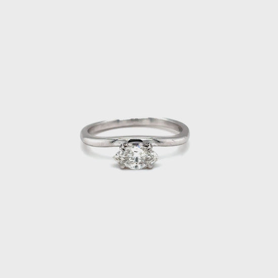 marquise cut diamond ring, solitaire diamond ring, white gold engagement ring, marquise diamond solitaire, white gold solitaire ring, minimalist diamond ring, elegant marquise ring, marquise diamond ring white gold, classic engagement ring, marquise cut white gold ring