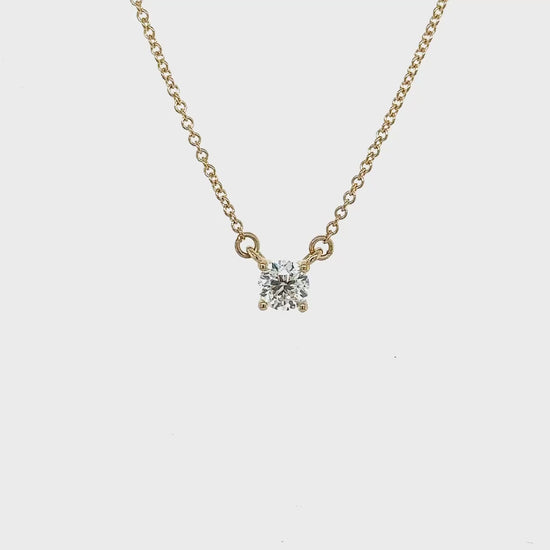 "Round Brilliant Cut Solitaire Diamond Necklace," "Solitaire Diamond Necklace," "Diamond Pendant Necklace," "Fine Jewelry," "Luxury Necklace," "Fashion Necklace," "Sparkling Diamond Necklace," "Statement Necklace," "Elegant Jewelry," "Special Occasion Necklace," "Diamond Jewelry," "Timeless Jewelry," "Handcrafted Necklace," "Unique Diamond Necklace," "Classic Solitaire Necklace."