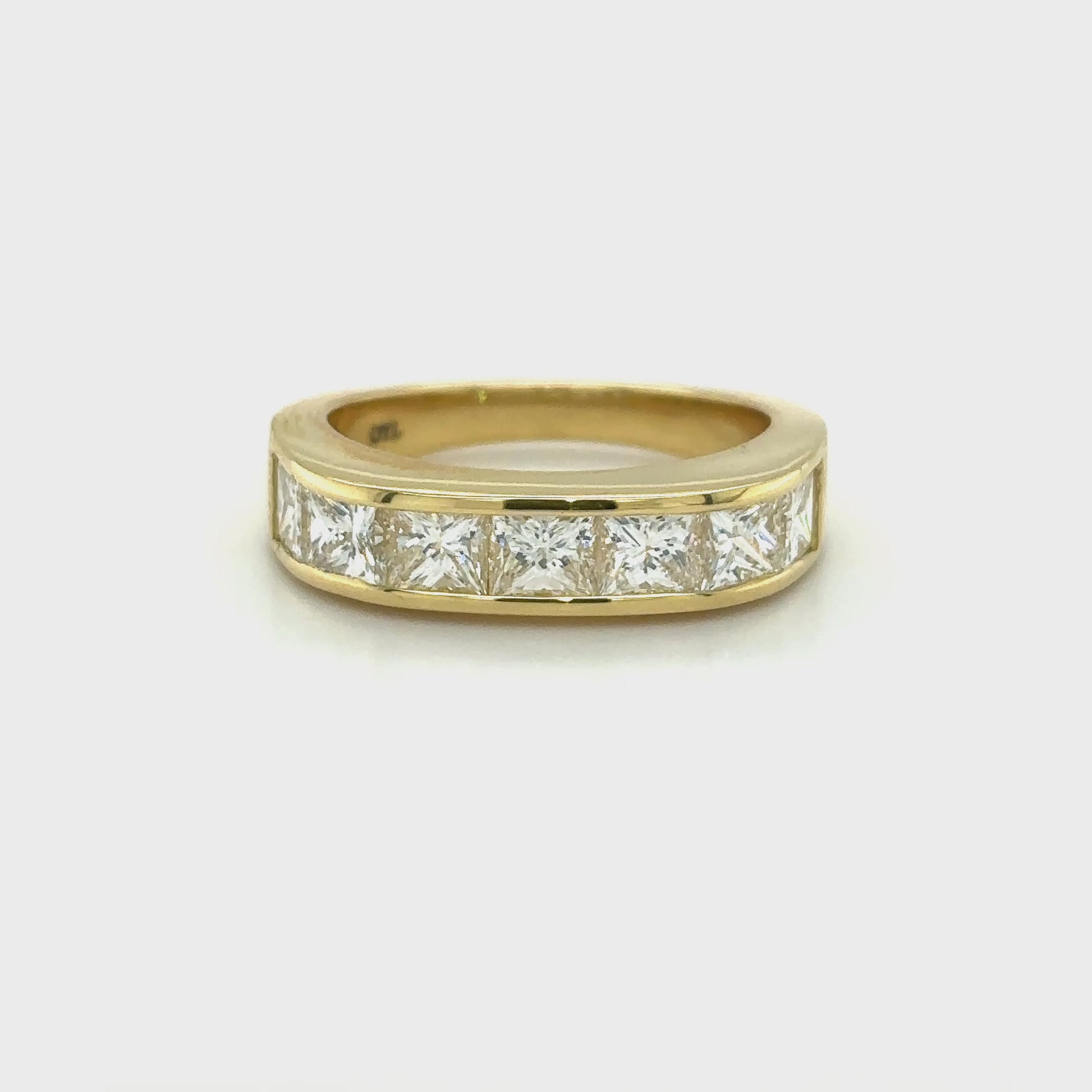 princess cut diamond band, channel set diamond ring, princess cut wedding band, modern diamond band, women’s diamond eternity ring