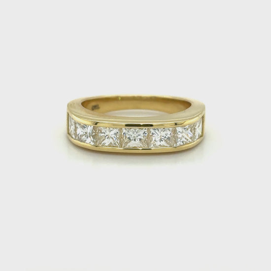 princess cut diamond band, channel set diamond ring, princess cut wedding band, modern diamond band, women’s diamond eternity ring