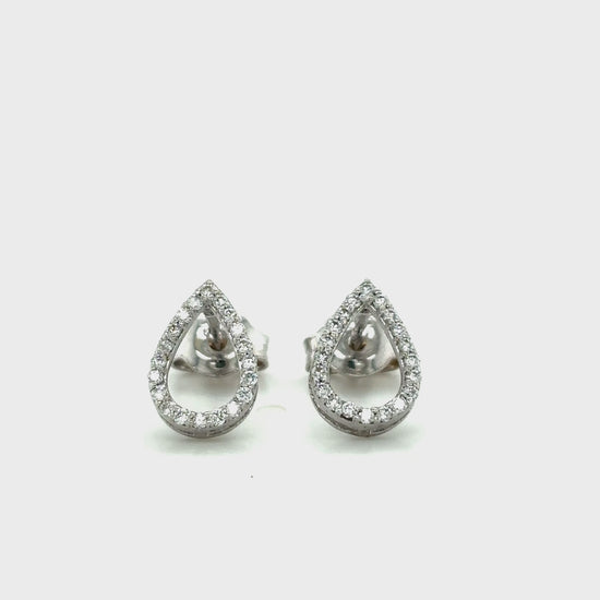 Elegant tear drop halo diamond stud earrings in white gold with sparkling round accent diamonds.