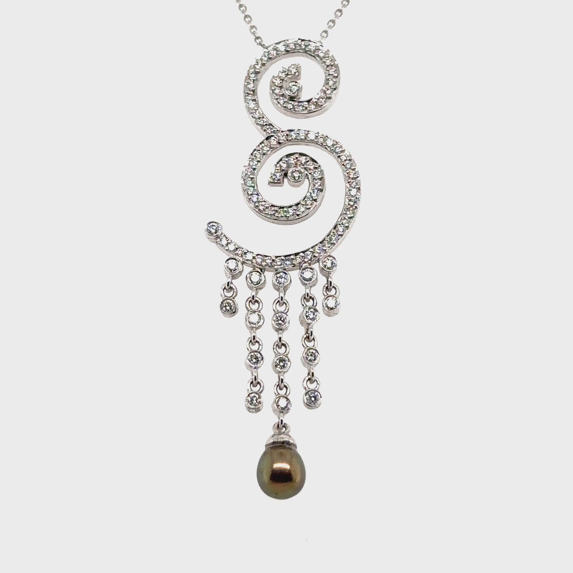 "Teardrop Pearl & Diamond Pendant," "Exquisite Teardrop Pearl Pendant with Diamonds," "Luxurious Diamond and Pearl Necklace," "Elegant Teardrop Pearl Necklace with Diamonds," "Fine Jewelry Pearl & Diamond Pendant," "High-Quality Teardrop Pearl Pendant with Diamonds," "Statement Pearl & Diamond Necklace," "Sparkling Teardrop Pearl & Diamond Pendant," "Beautiful Diamond and Pearl Pendant," "Fashionable Teardrop Pearl Necklace with Diamonds."