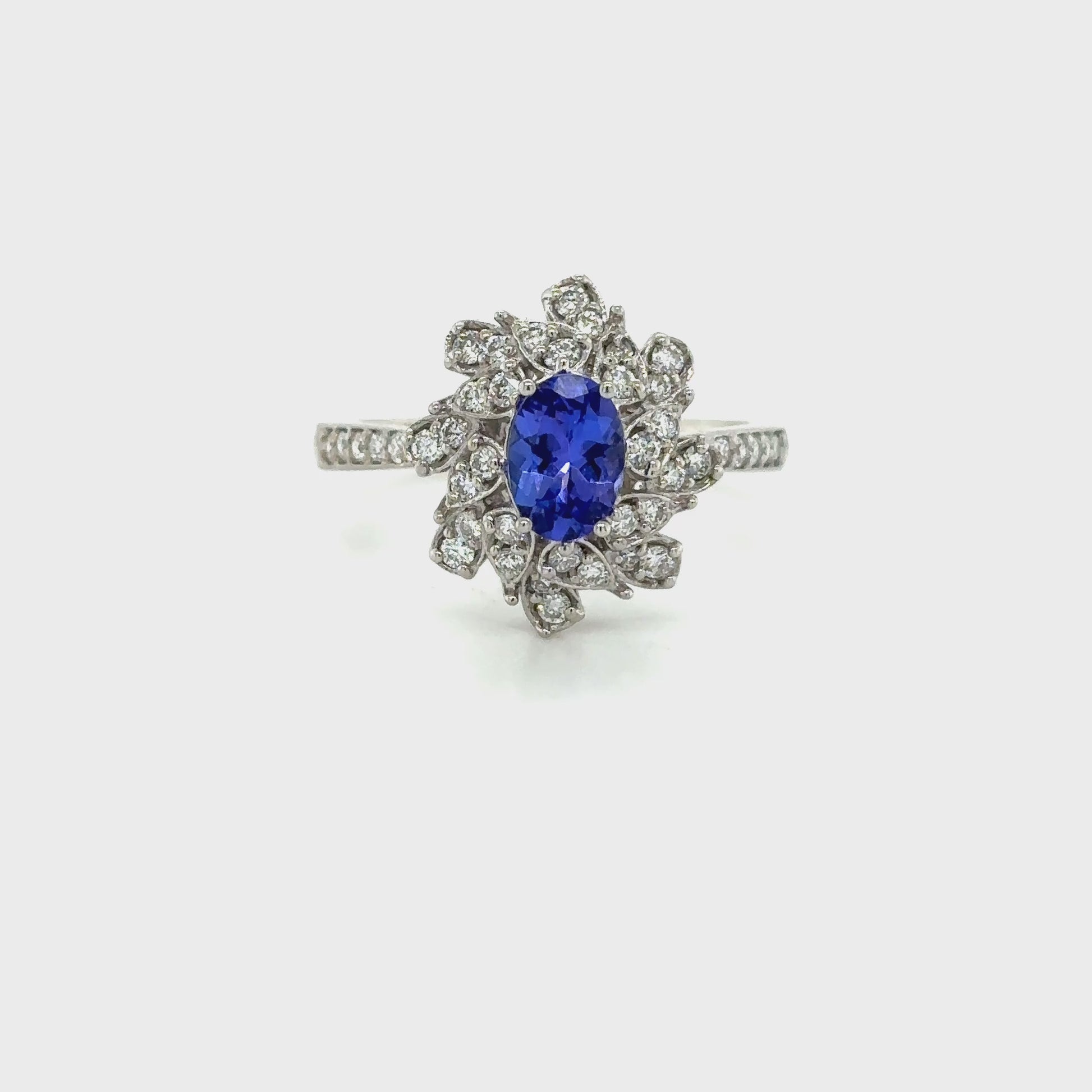Halo Tanzanite Ring
Tanzanite and Diamond Ring
Oval Cut Tanzanite Jewelry
Unique Tanzanite Ring Design
December Birthstone Ring
White Gold Tanzanite Ring
Oval Tanzanite Ring
Tanzanite Diamond Halo Ring
Floral Diamond Ring
Tanzanite Engagement Ring