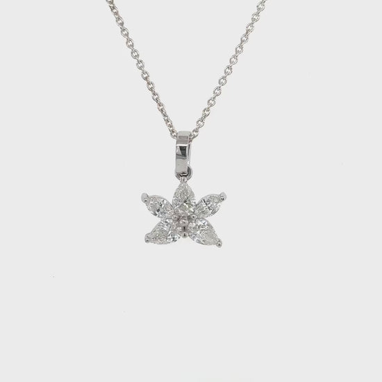 Marquise and pear-shaped illusion diamond pendant, elegant jewelry piece, sparkling gemstones, unique pendant design, luxurious accessory, fine craftsmanship, statement necklace, exquisite diamond pendant, sophisticated jewelry, timeless beauty
