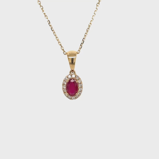 Oval Ruby & Diamond Halo Pendant: oval ruby pendant, diamond halo necklace, elegant jewelry, ruby and diamond pendant, sparkling gemstone necklace, luxurious accessory, fine jewelry piece, statement pendant, ruby and diamond combination, stunning gemstone jewelry.
