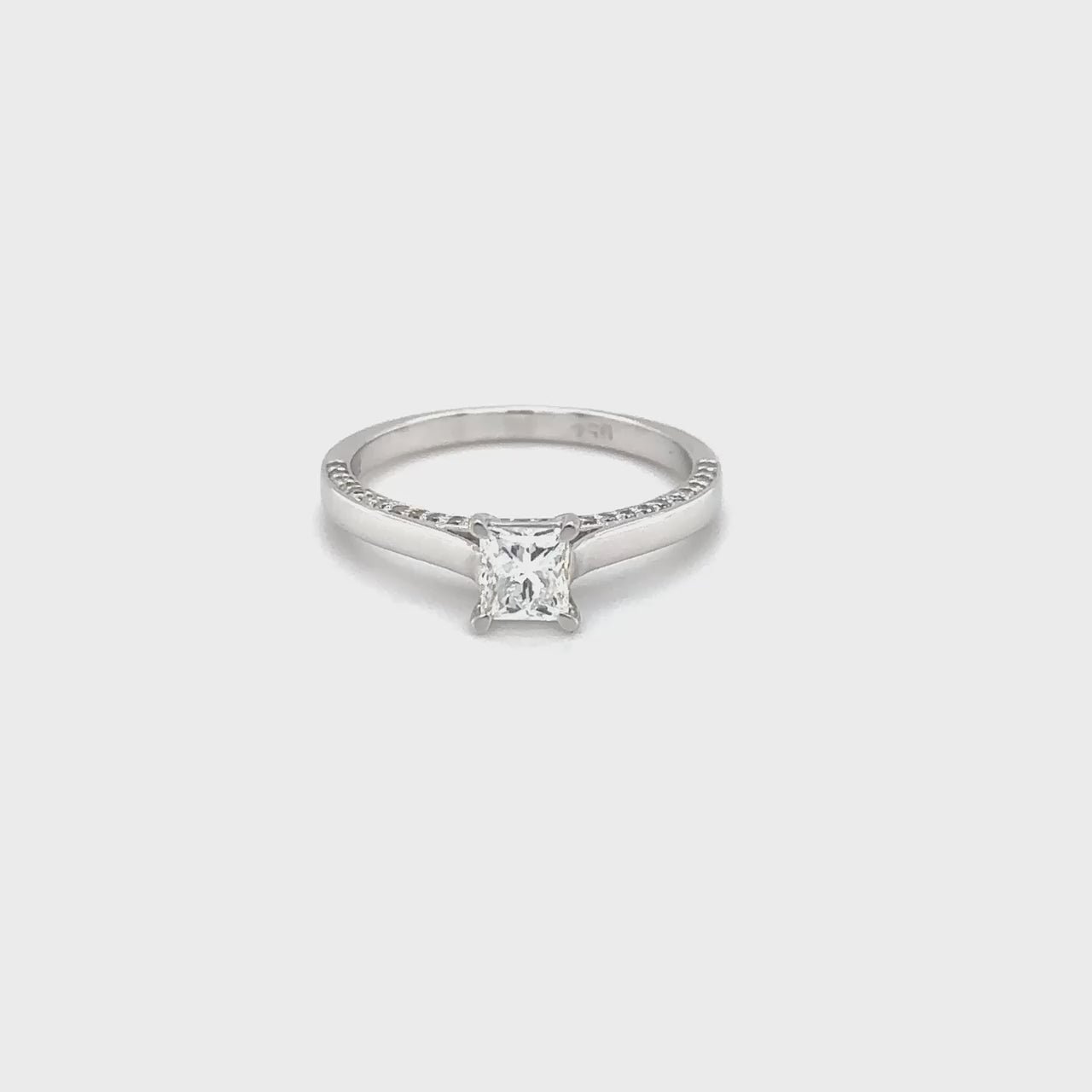 "A stunning cushion-cut diamond ring," "a luxurious solitaire engagement ring," "a sparkling diamond ring for special occasions," "an elegant cushion-cut solitaire ring," "a timeless diamond ring design," "a classic cushion-cut diamond engagement ring."