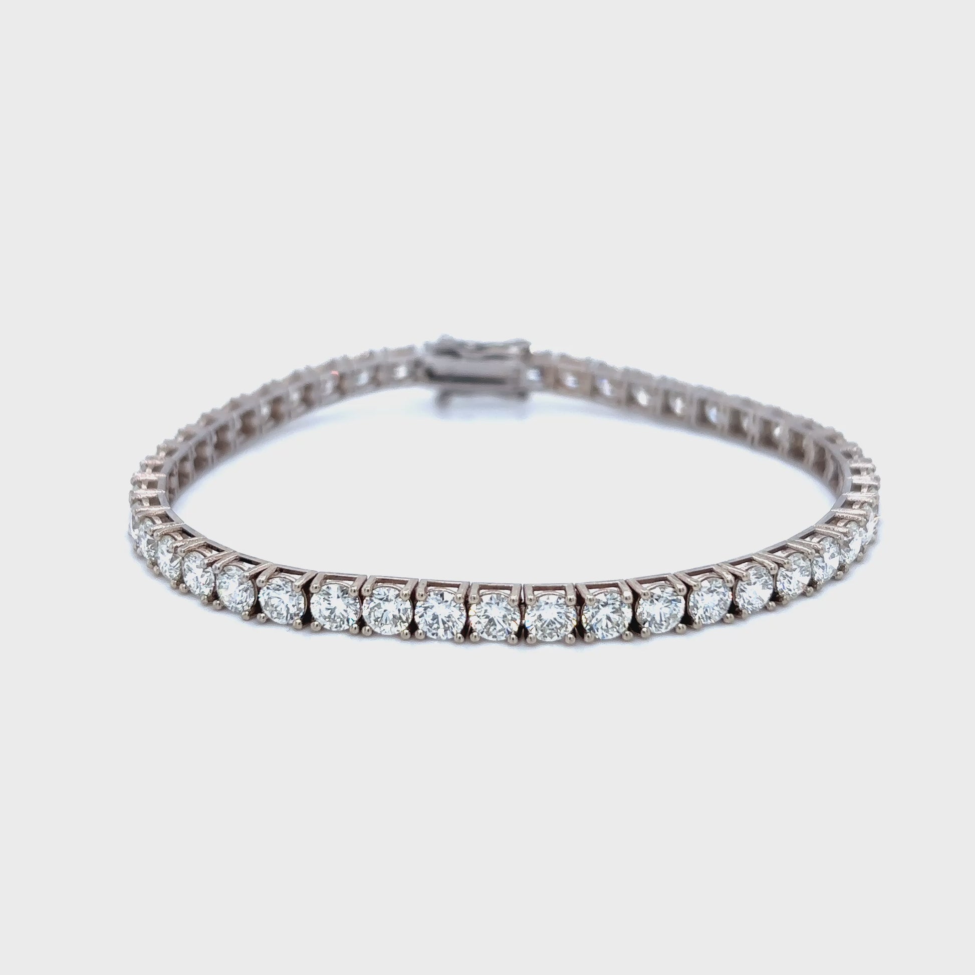 Diamond tennis bracelet, classic diamond bracelet, elegant diamond line bracelet, round brilliant cut diamond bracelet, fine jewelry tennis bracelet, luxury diamond bracelet for women, timeless diamond jewelry, designer tennis bracelet, white gold diamond bracelet, everyday diamond bracelet.