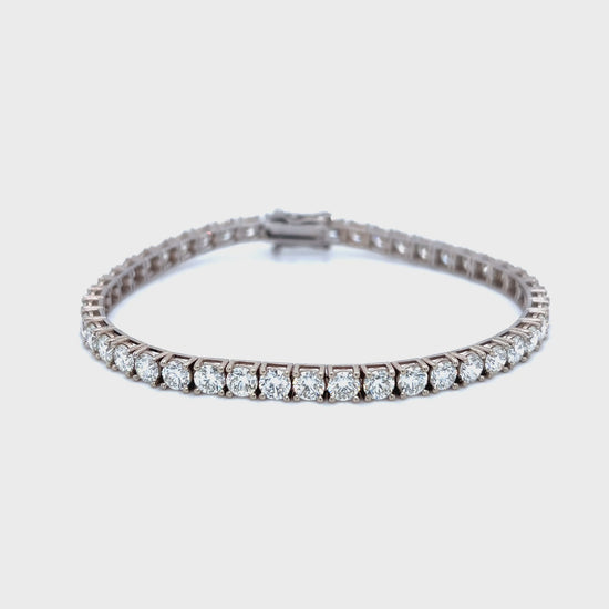 Diamond tennis bracelet, classic diamond bracelet, elegant diamond line bracelet, round brilliant cut diamond bracelet, fine jewelry tennis bracelet, luxury diamond bracelet for women, timeless diamond jewelry, designer tennis bracelet, white gold diamond bracelet, everyday diamond bracelet.