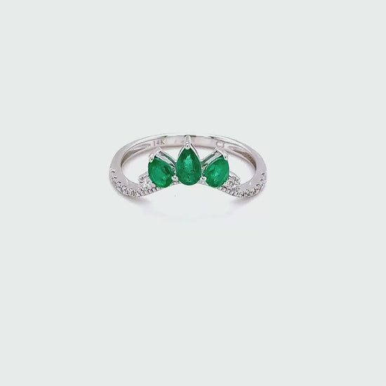 Pear shape emerald trilogy ring, emerald and diamond ring, pear cut gemstone ring, emerald and diamond trilogy ring, pear shaped gemstone ring.