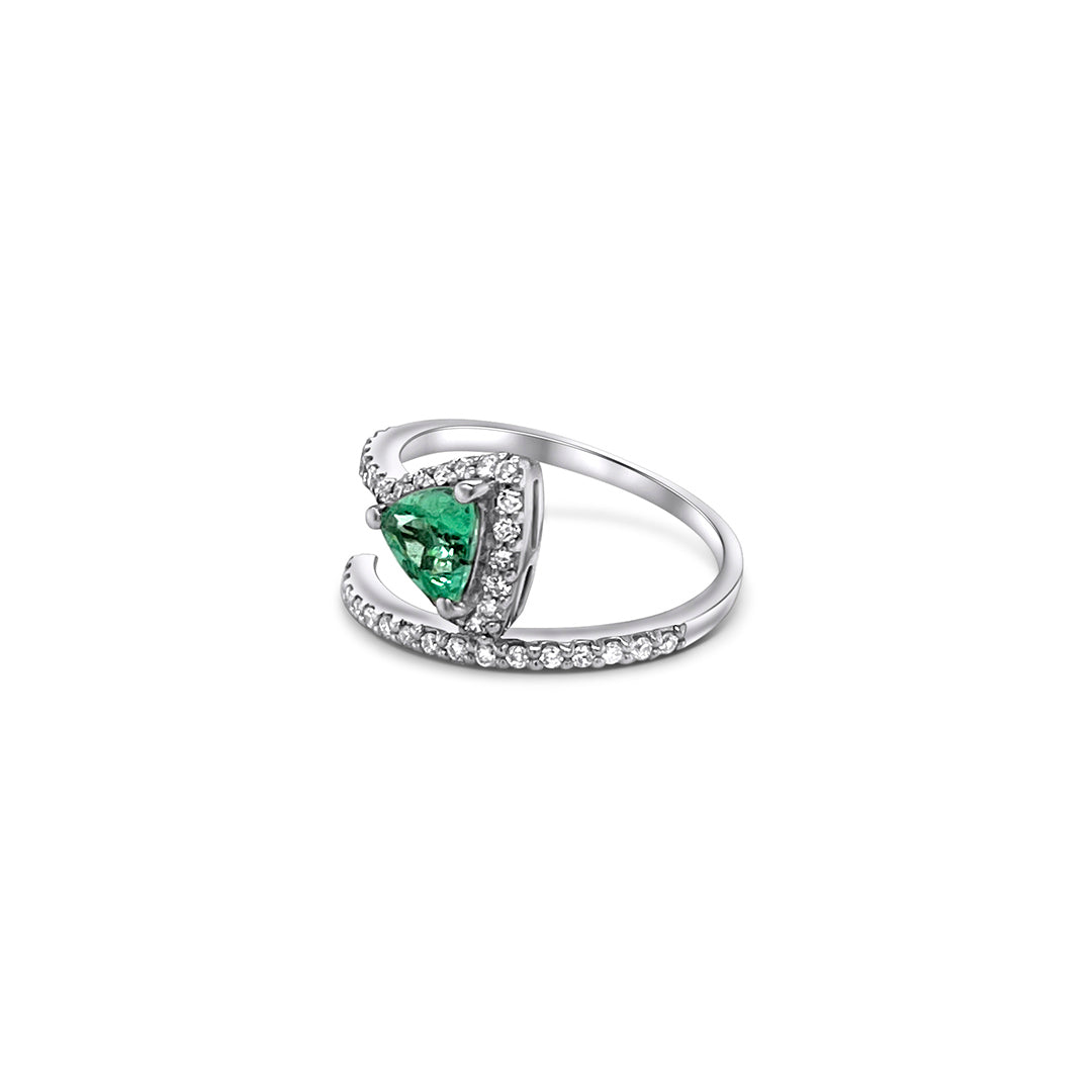 Trillion cut tourmaline ring, diamond accent ring, exquisite gemstone jewelry, luxurious trillion cut ring, vibrant tourmaline centerpiece, sparkling diamond embellishments, elegant gemstone and diamond ring, stunning trillion cut tourmaline, dazzling diamond accents, opulent tourmaline and diamond jewelry.