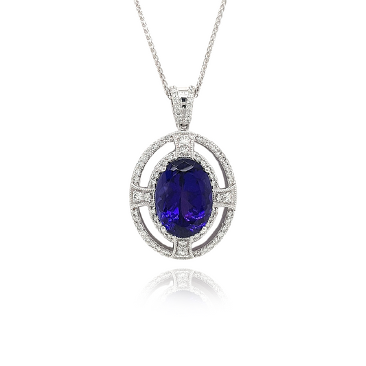 Oval Tanzanite, Halo Diamond Pendant, Gemstone Jewelry, Elegant Necklace, Fine Jewelry, Luxury Accessories, Statement Piece, Precious Stones, Special Occasion, Gift for Her, Glamorous Design, Sparkling Diamonds, Sterling Silver Setting, Exquisite Craftsmanship, High-Quality Materials