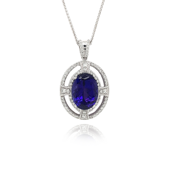 Oval Tanzanite, Halo Diamond Pendant, Gemstone Jewelry, Elegant Necklace, Fine Jewelry, Luxury Accessories, Statement Piece, Precious Stones, Special Occasion, Gift for Her, Glamorous Design, Sparkling Diamonds, Sterling Silver Setting, Exquisite Craftsmanship, High-Quality Materials