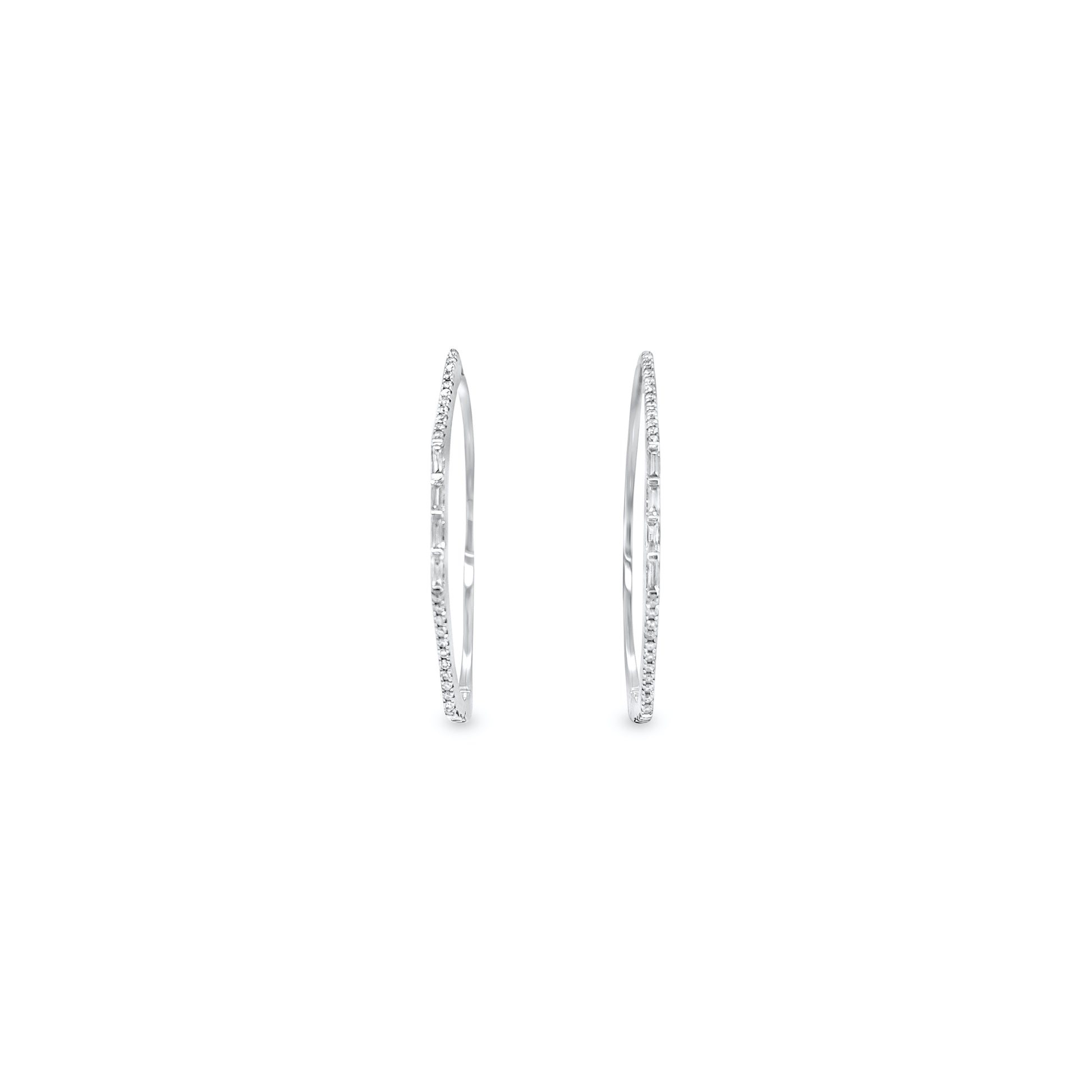 Round brilliant diamond hoop earrings, sparkling and elegant jewelry, baguette diamonds in hoops, glamorous and sophisticated earrings, fine craftsmanship in diamond hoop design.