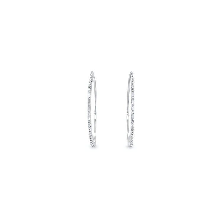 Round brilliant diamond hoop earrings, sparkling and elegant jewelry, baguette diamonds in hoops, glamorous and sophisticated earrings, fine craftsmanship in diamond hoop design.