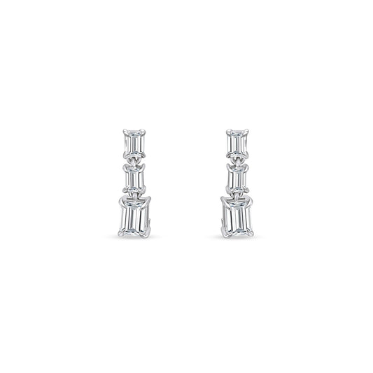 Emerald Cut Diamond Drop Earrings, sophisticated jewelry, elegant diamond earrings, sparkling gemstone drops, luxurious emerald-cut design, exquisite jewelry accessories, statement earrings, fine craftsmanship, glamorous diamond jewelry, radiant gemstone drops, timeless and refined style.