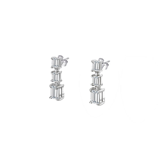Emerald Cut Diamond Drop Earrings, sophisticated jewelry, elegant diamond earrings, sparkling gemstone drops, luxurious emerald-cut design, exquisite jewelry accessories, statement earrings, fine craftsmanship, glamorous diamond jewelry, radiant gemstone drops, timeless and refined style.