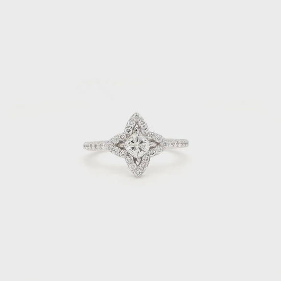 "Cushion Cut Diamond Ring with Halo Setting" "Floral Inspired Cushion Cut Engagement Ring" "Halo Flower Design Diamond Ring" "Exquisite Cushion Cut Halo Ring" "Elegant Floral Halo Diamond Engagement Ring" "Cushion Cut Sparkling Diamond Ring with Halo" "Intricate Flower Halo Setting for Cushion Cut Diamond" "Vintage-inspired Cushion Cut Halo Engagement Ring"