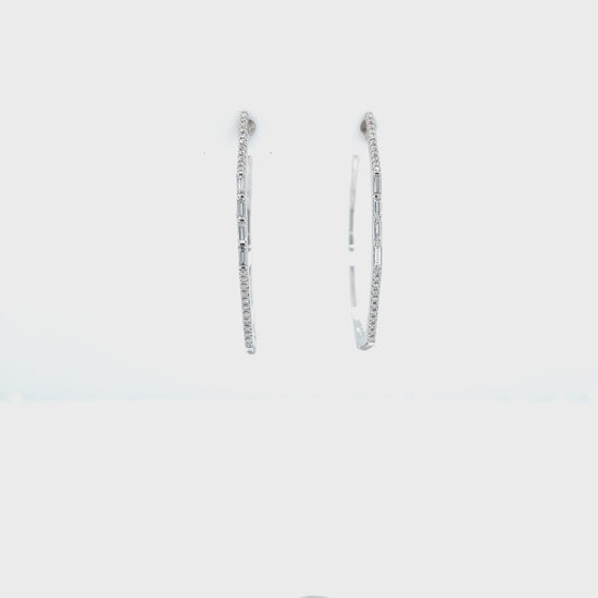 Round brilliant diamond hoop earrings, sparkling and elegant jewelry, baguette diamonds in hoops, glamorous and sophisticated earrings, fine craftsmanship in diamond hoop design.