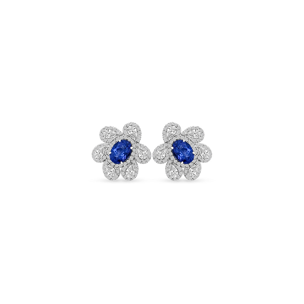 Main Image: "1.60ct Oval Tanzanite & Multi-Shape Floral Diamond Stud Earrings" Tanzanite Detail: "Vivid Oval Tanzanite Gemstone" Floral Diamond Arrangement: "Intricate Floral Diamond Design" Earring Profile: "Multi-Shape Floral Stud Earring Profile" Custom Open Liners: "Earrings with Different Open Liner Options" Timeless Elegance: "Diamond Stud Earrings with Tanzanite and Floral Design"