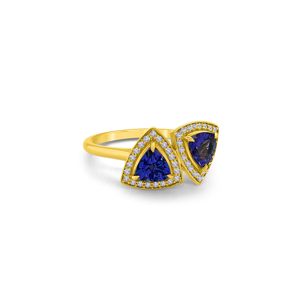 Main Image: "1.30ct Trillion Cut Tanzanite & Diamond Halo Ring" Tanzanite Detail: "Trillion Cut Tanzanite Gemstone in Halo Setting" Diamond Halo: "Diamond Halo Enhancing Trillion Cut Tanzanite" Ring Profile: "Trillion Cut Tanzanite & Diamond Halo Ring Profile" Customizable Liners: "Ring with Different Open Liners for Personalization" Radiant Beauty: "Elegantly Designed Trillion Cut Tanzanite & Diamond Ring
