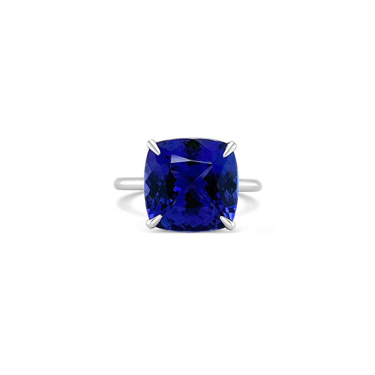 Main Image: "8.40ct Solitaire Cushion Tanzanite & Diamond Ring" Tanzanite Detail: "Vivid Cushion-Cut Tanzanite Gemstone" Diamond Halo: "Diamond Halo Accentuating Tanzanite Ring" Ring Profile: "Solitaire Tanzanite & Diamond Ring with Custom Open Liners" Elegant Craftsmanship: "Luxury Cushion Tanzanite Ring by BYL Diamonds"