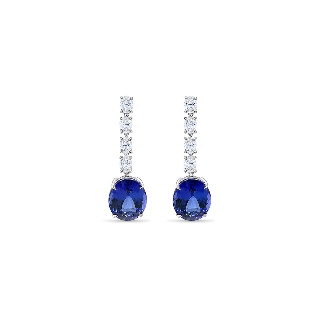 Main Image: "13.00ct Oval Tanzanite & Diamond Dangle Drop Earrings" Tanzanite Detail: "Deep Violet-Blue Oval Tanzanite Gemstone" Diamond Halo: "Halo of Diamonds Surrounding Oval Tanzanite" Earring Profile: "Elegant Profile of Dangle Drop Earrings" Customizable Liners: "Earrings with Different Open Liner Options" Luxurious Presentation: "Oval Tanzanite & Diamond Earrings in Elegant Display"