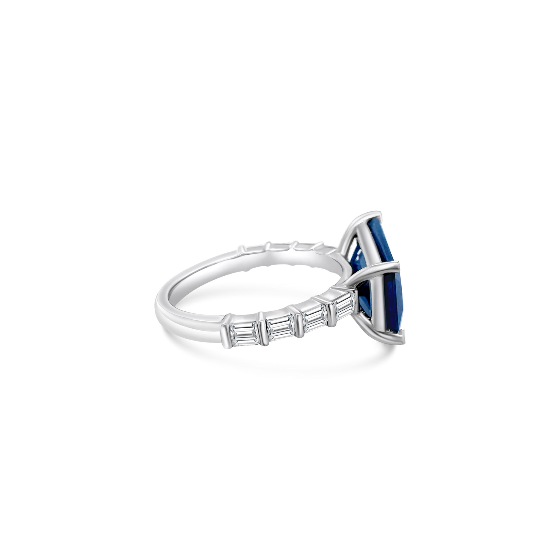 "Radiant sapphire ring, blue gemstone jewelry, sparkling diamond accents, elegant gemstone ring, luxury jewelry, statement ring, fine jewelry piece, special occasion accessory."