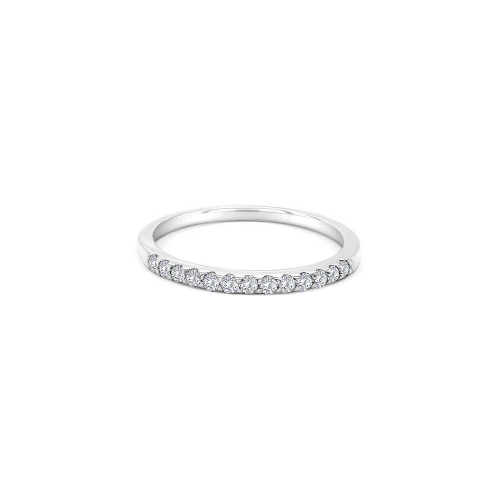 A sparkling, Round Brilliant Half Eternity Diamond Ring, showcasing timeless elegance, exquisite craftsmanship, and unparalleled beauty, perfect for celebrating milestones, symbolizing eternal love, and adding a touch of luxury to any ensemble.